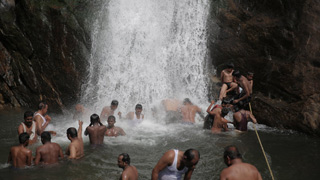 Travellers enjoying at Palaruvi falls